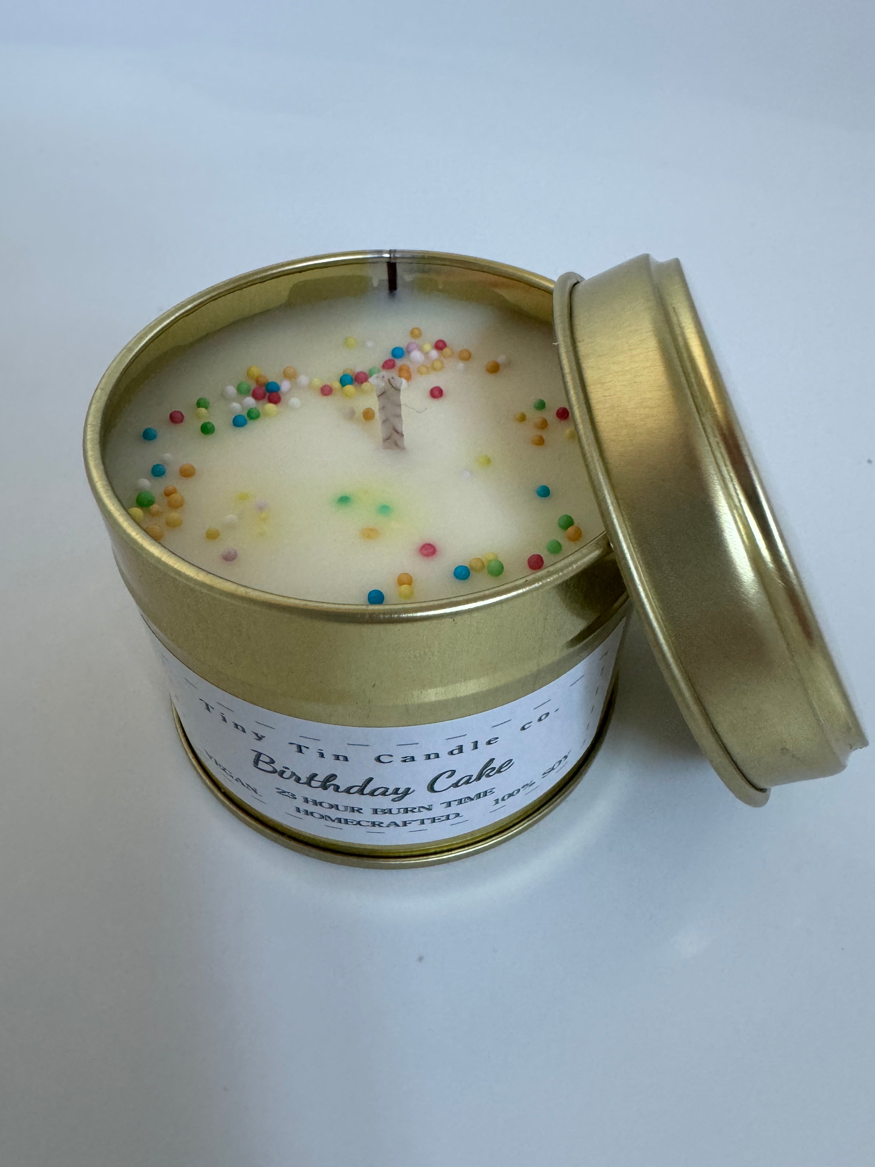 Homemade Candle Birthday Cake fragrance 100ml rose gold tin with birthday cake white and black label Top of Candle