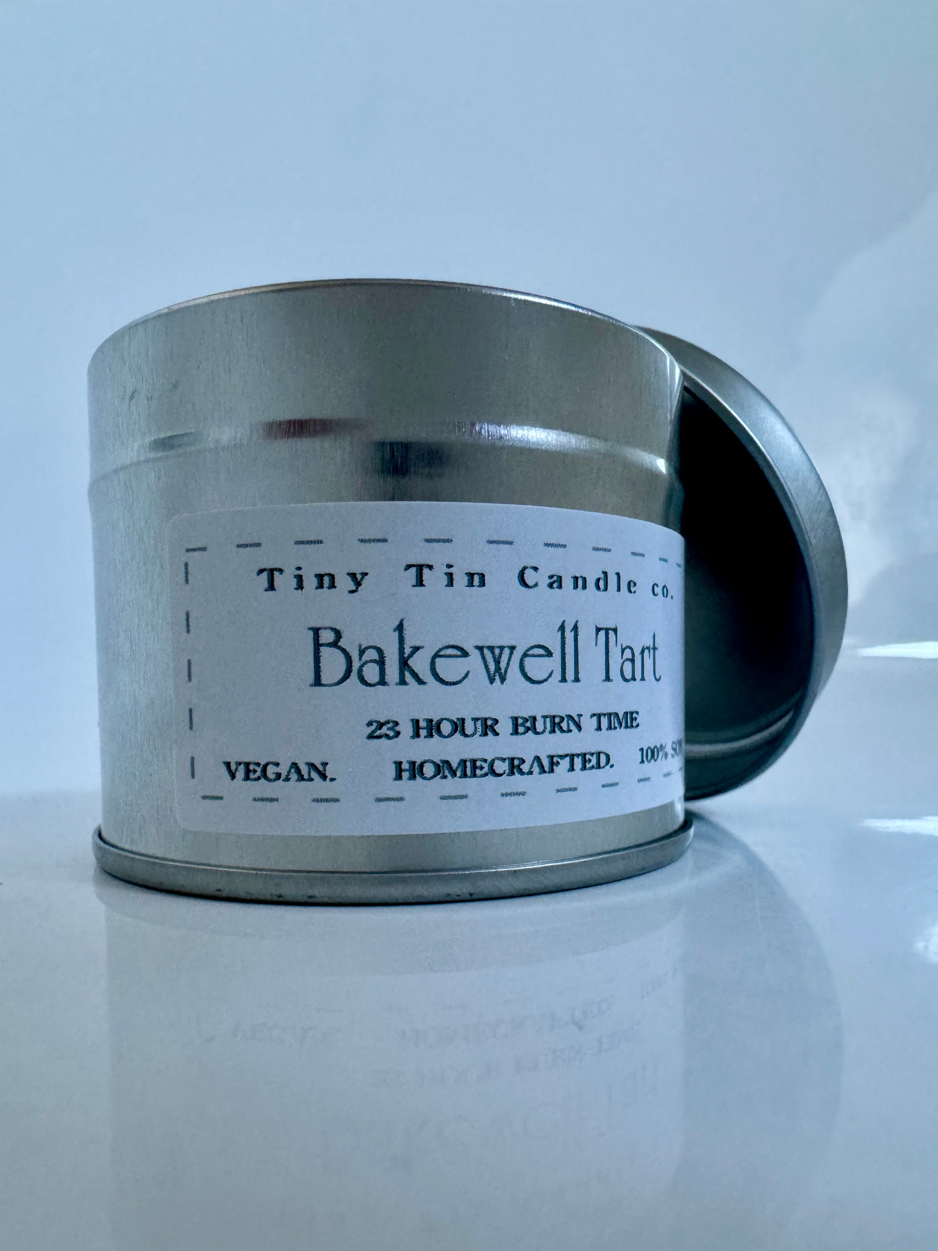 Homemade Candle Soy Tin Candle Bakewell Tart 100ml  front of candle 