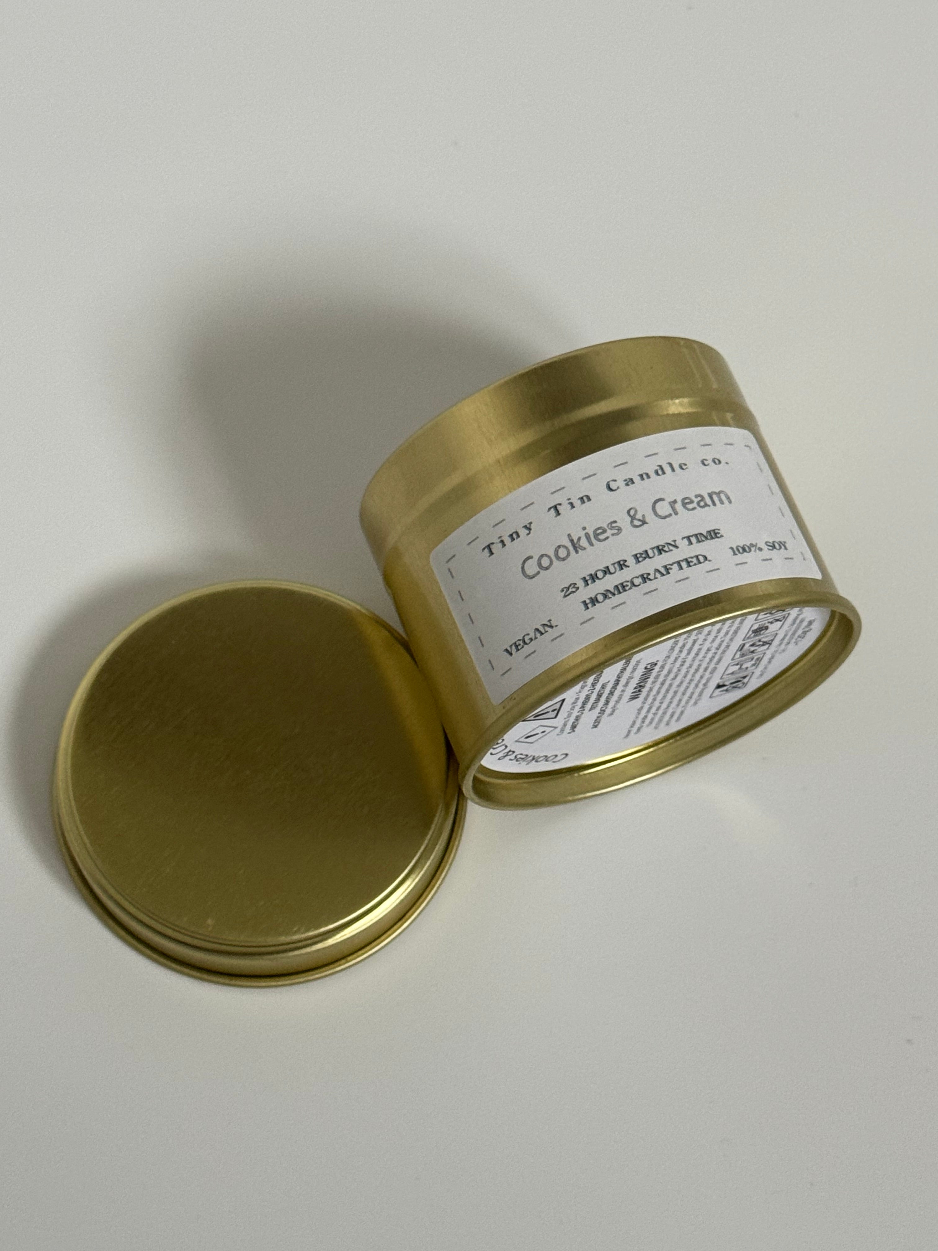 Homemade Candle Cookies and Cream Soy Candle 100ml Tin. Candle laying on side to show bottom and front of candle