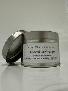 Homemade Candle Chocolate Orange Soy Candle 100ml Tin, front of candle with lid leaning against it 