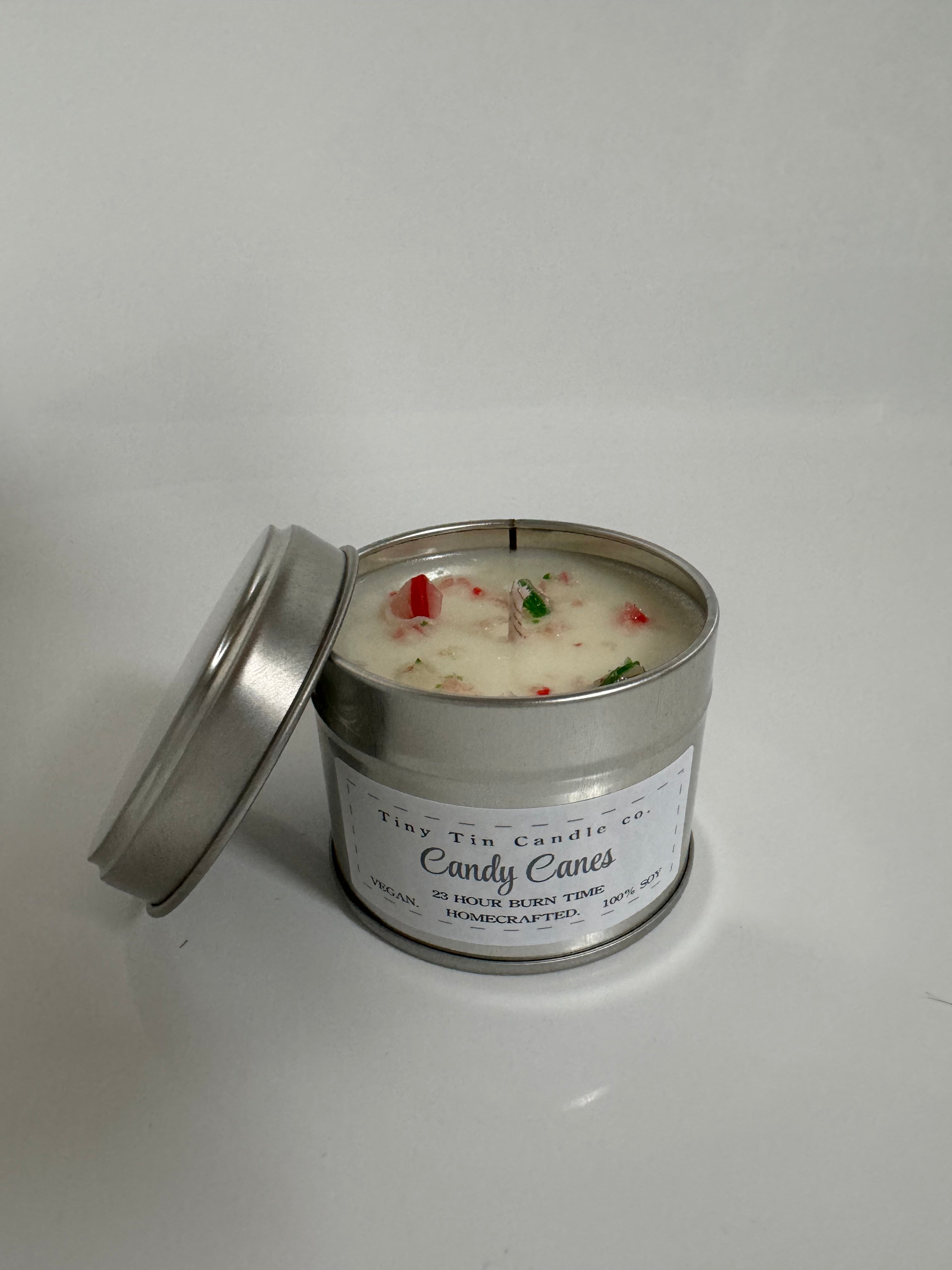 Homemade Candle Candy Cane Christmas 100ml Soy Tin Candle. Shows front and top of candle.