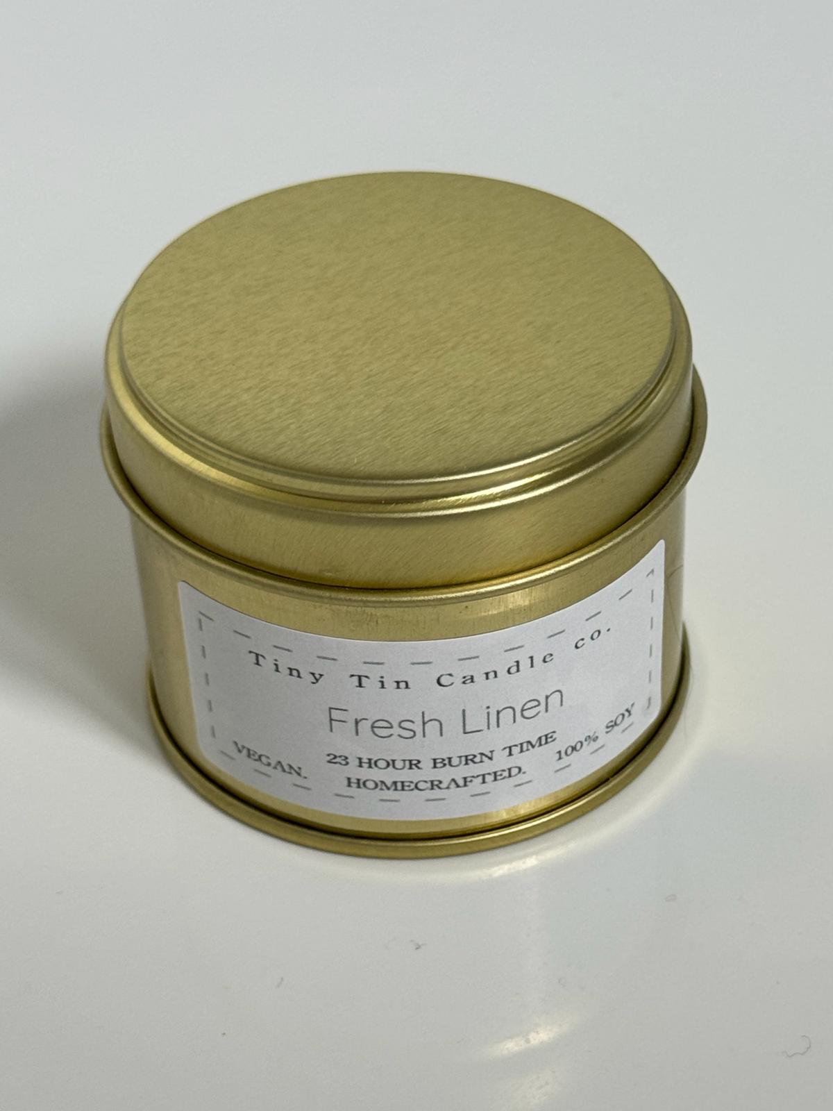 Homemade Candle Fresh Linen Soy Candle Tin 100ml, front of candle with lid on.