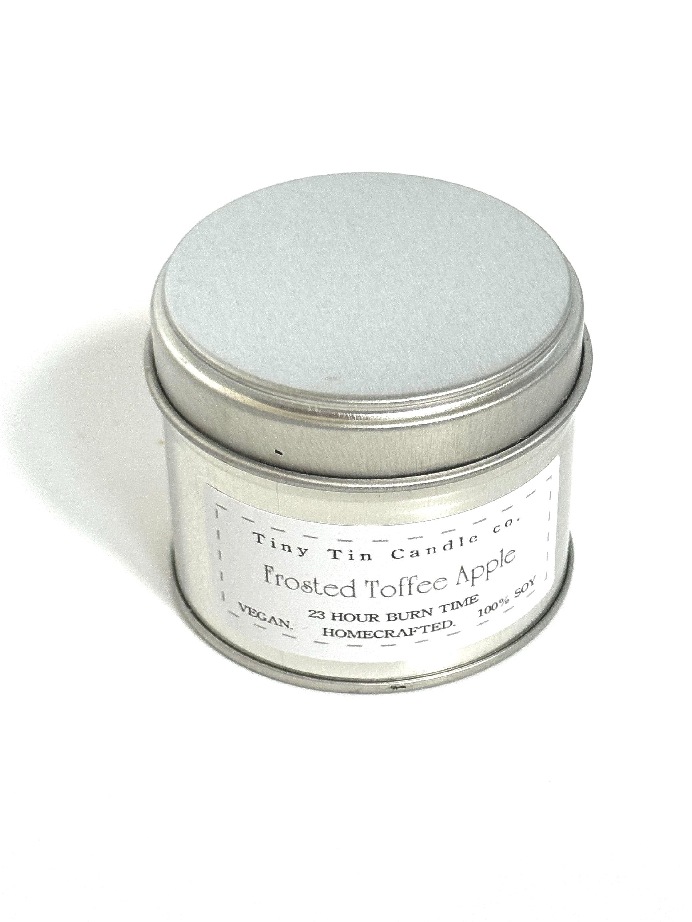 Homemade Candle Frosted Toffee Apple Soy Tin Candle 100ml . Candle laying on side front and bottom of candle