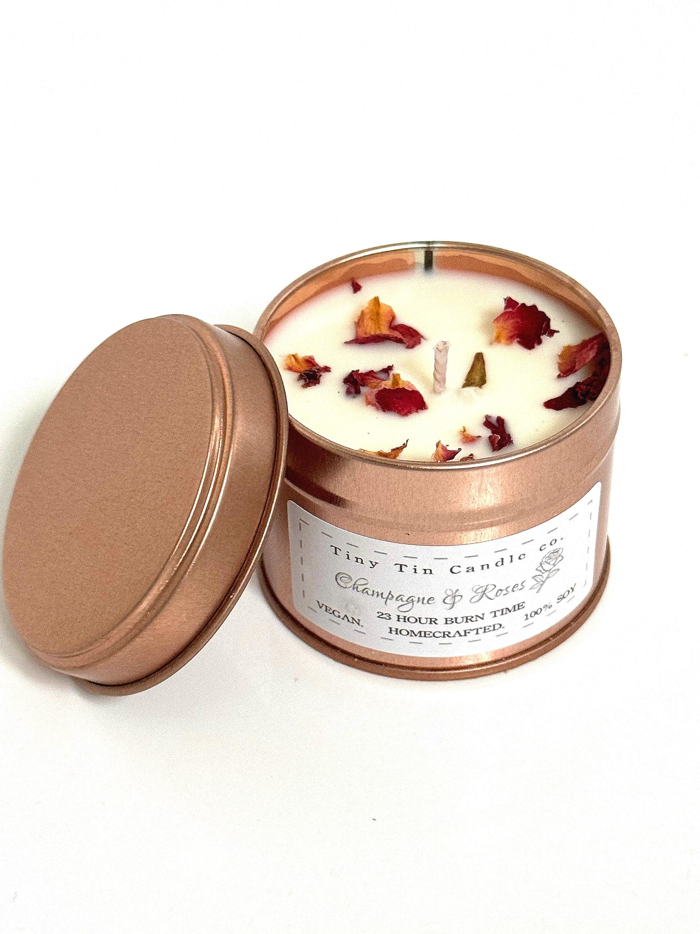 Homemade Candle Champagne & Roses Soy Tin Candle 100ml Tin. Front of candle shown with lid on,
