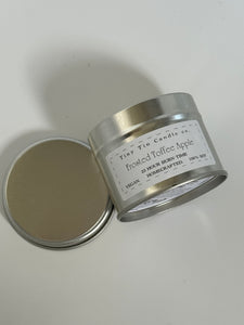 Homemade Candle Frosted Toffee Apple Soy Tin Candle 100ml . Candle laying on side front and bottom of candle