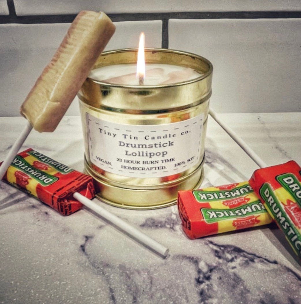 Homemade Candle Drumstick Lollipop Soy Tin Cande 100ml. Gold Tin  filled with soy wax drumstick scented surrounded by drumstick lollipops